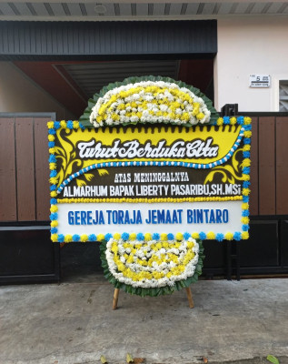 Papan Bunga Duka di Bunut Hilir